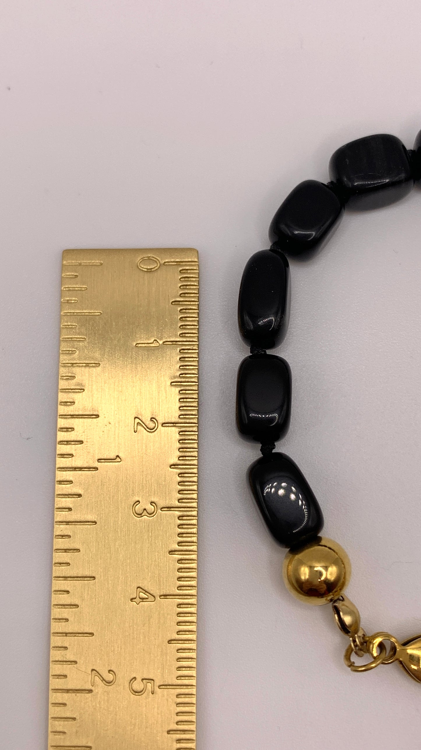 Armband Black Feather AMM