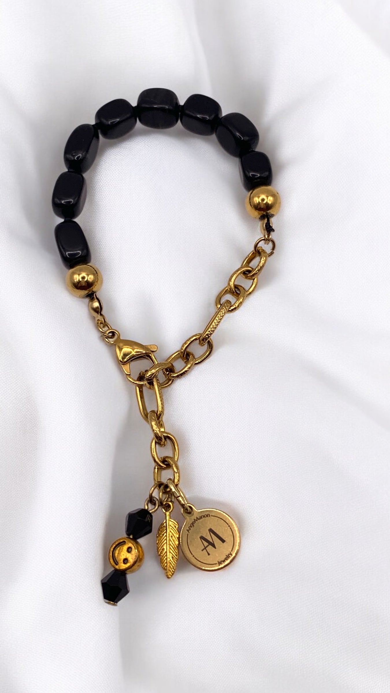 Armband Black Feather AMM