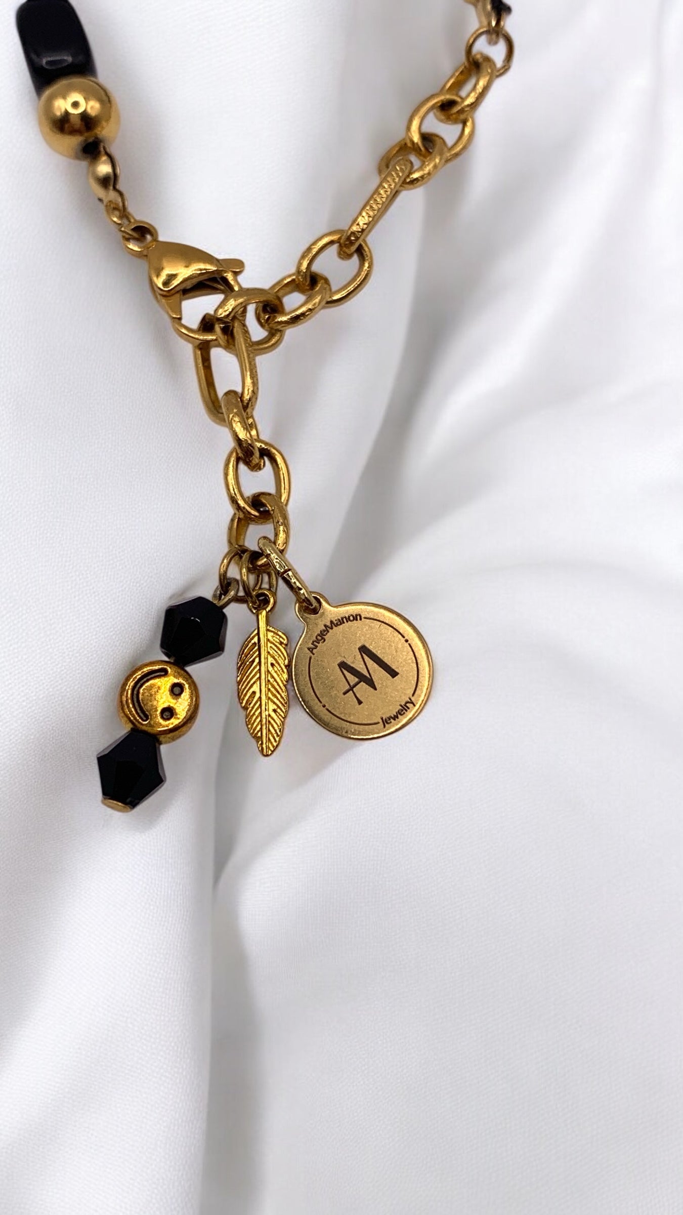 Armband Black Feather AMM