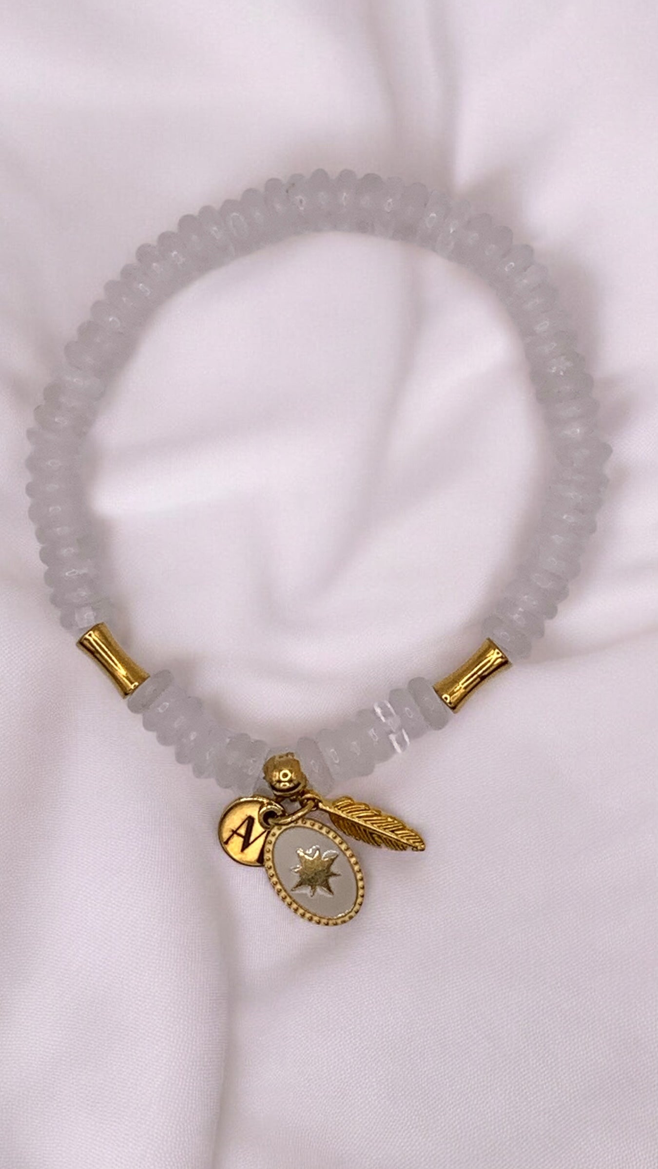 Armband White Star and Golden Feather AMM