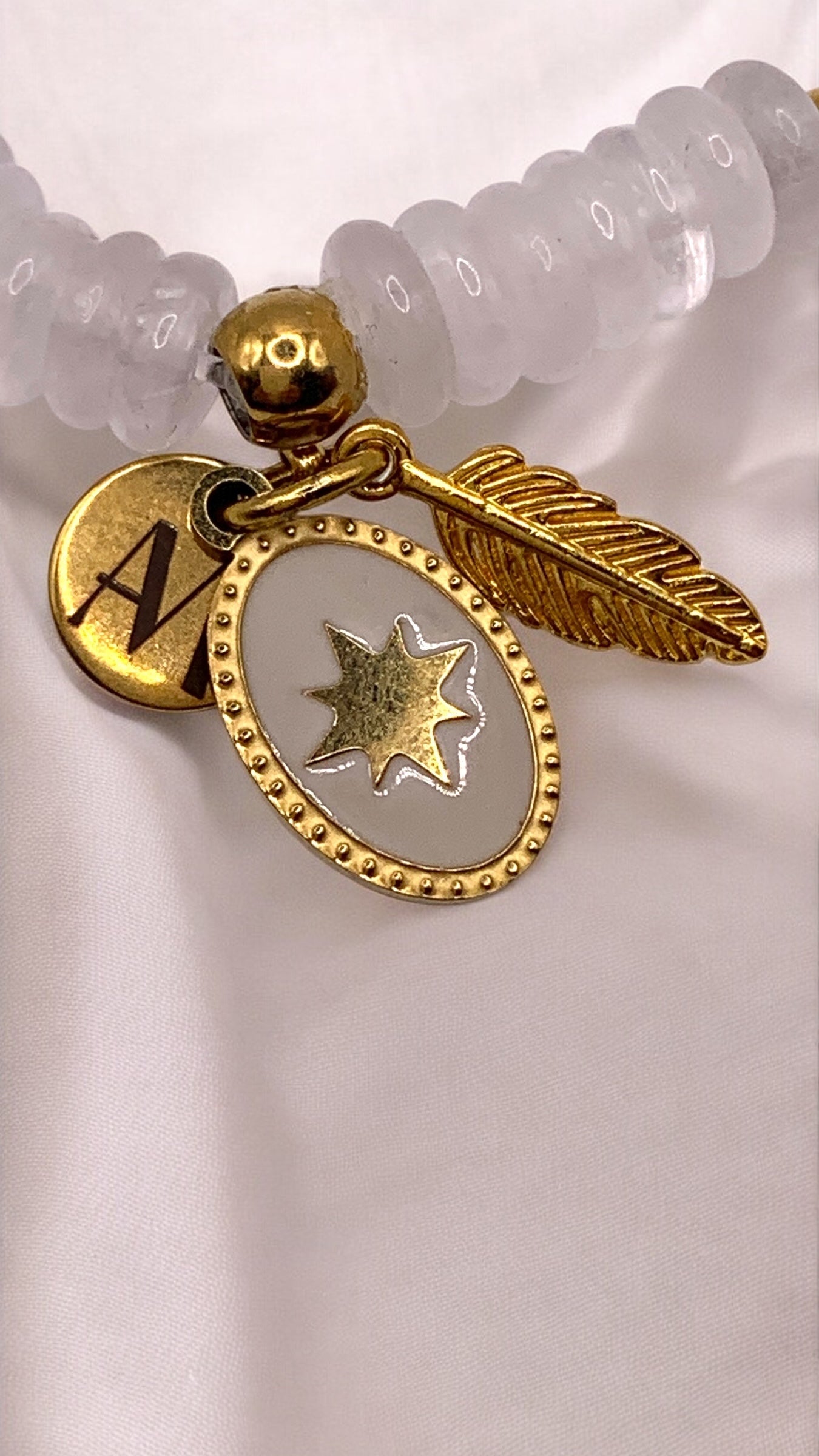 Armband White Star and Golden Feather AMM