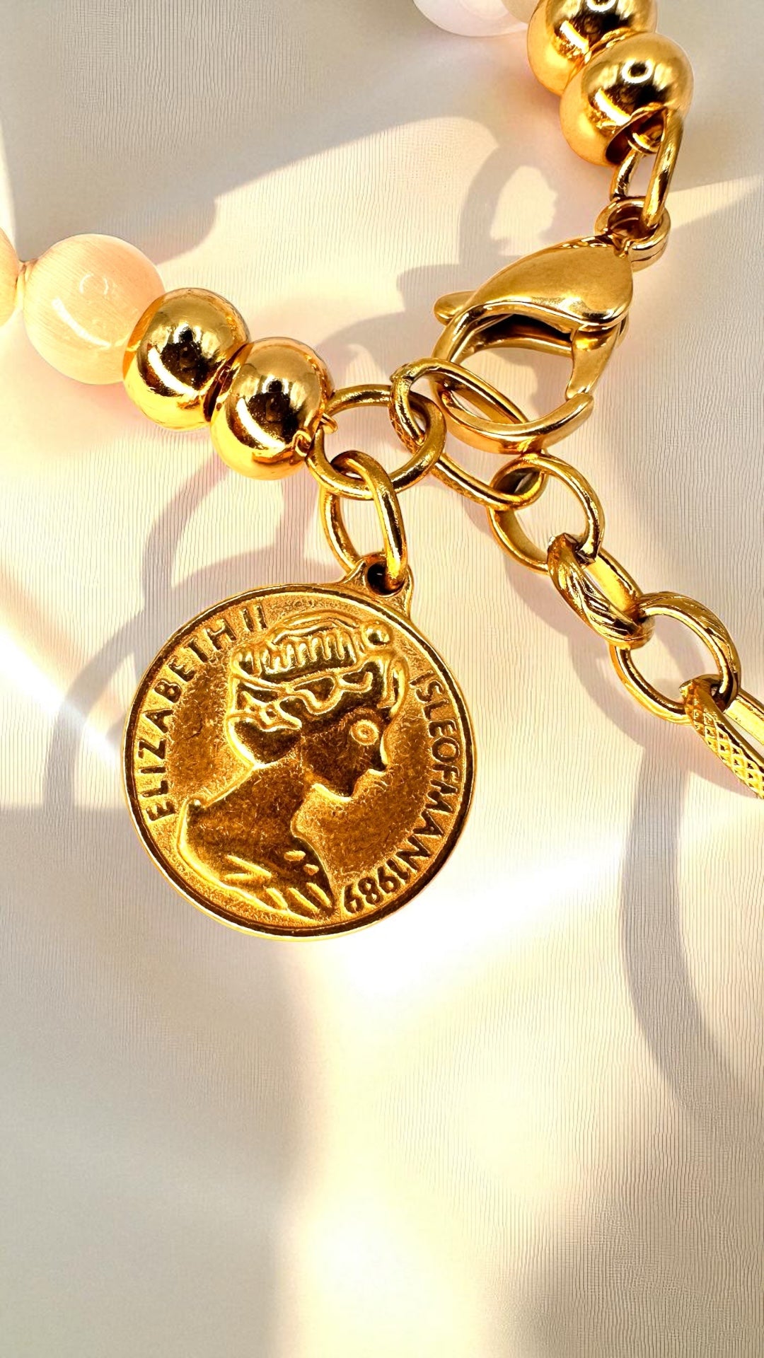 Armband Cateye Coin AMA